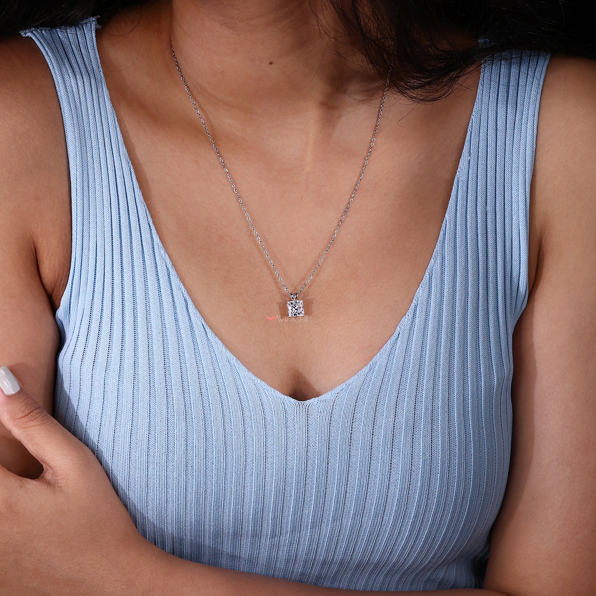 Bunny ear pendant with a playful, charming design.