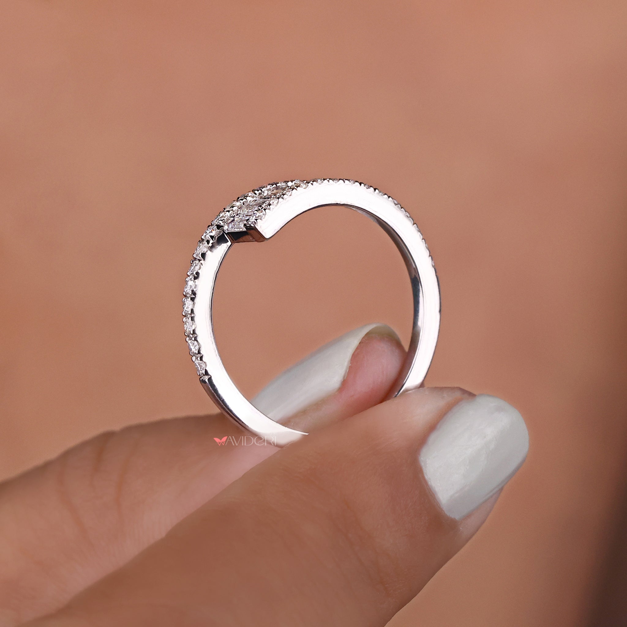 A white gold engagement ring.
