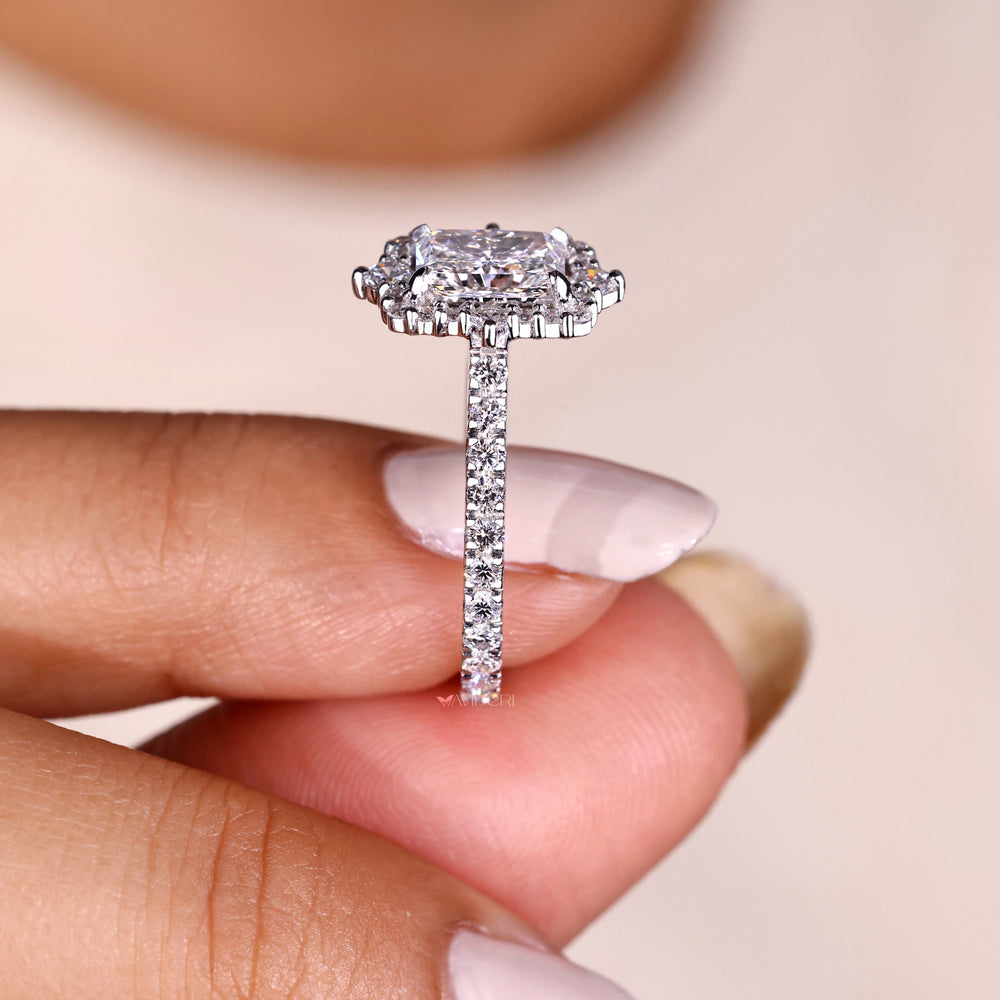 White gold engagement ring with a halo diamond design for elegant charm.