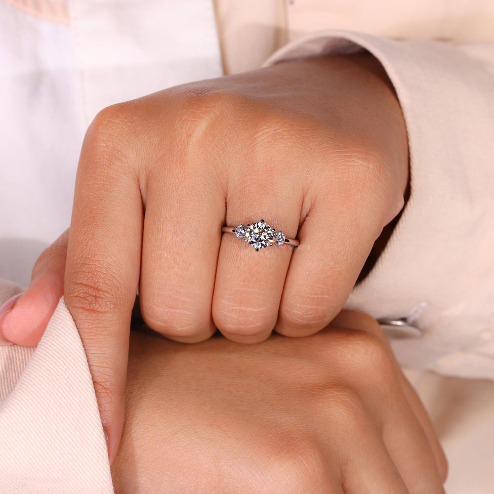 Brilliant round cut diamond ring in a high setting engagement ring style.
