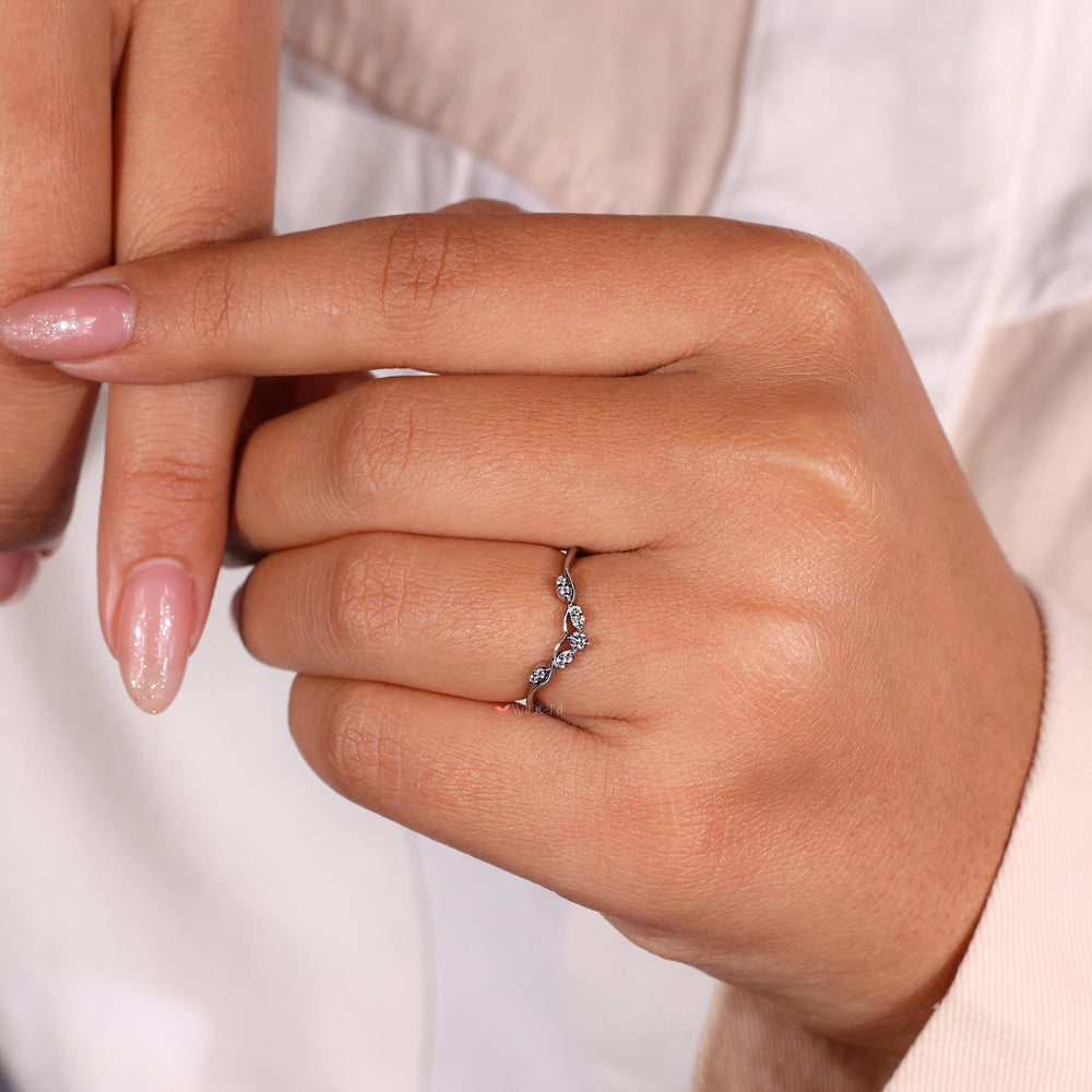 Marquise wedding ring with a leaf design, ideal for nature-inspired jewelry.
