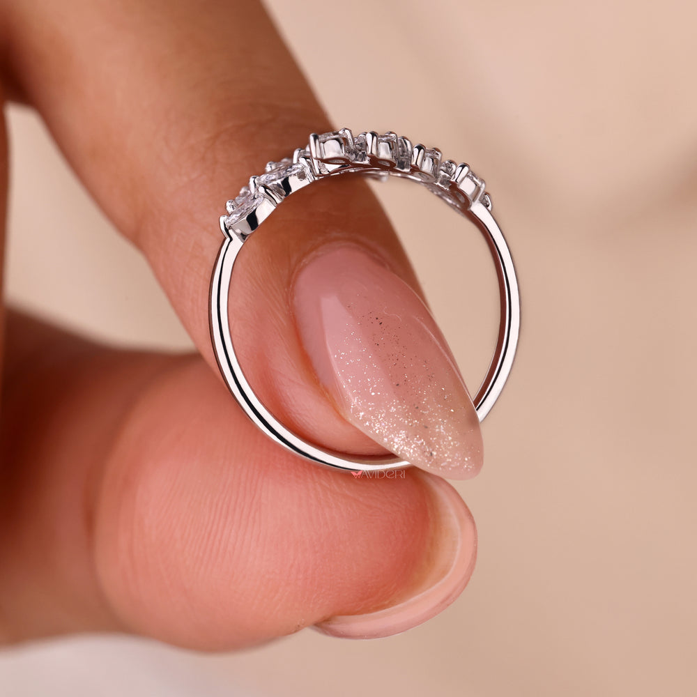 Unique marquise cut diamond ring showcasing intricate craftsmanship.
