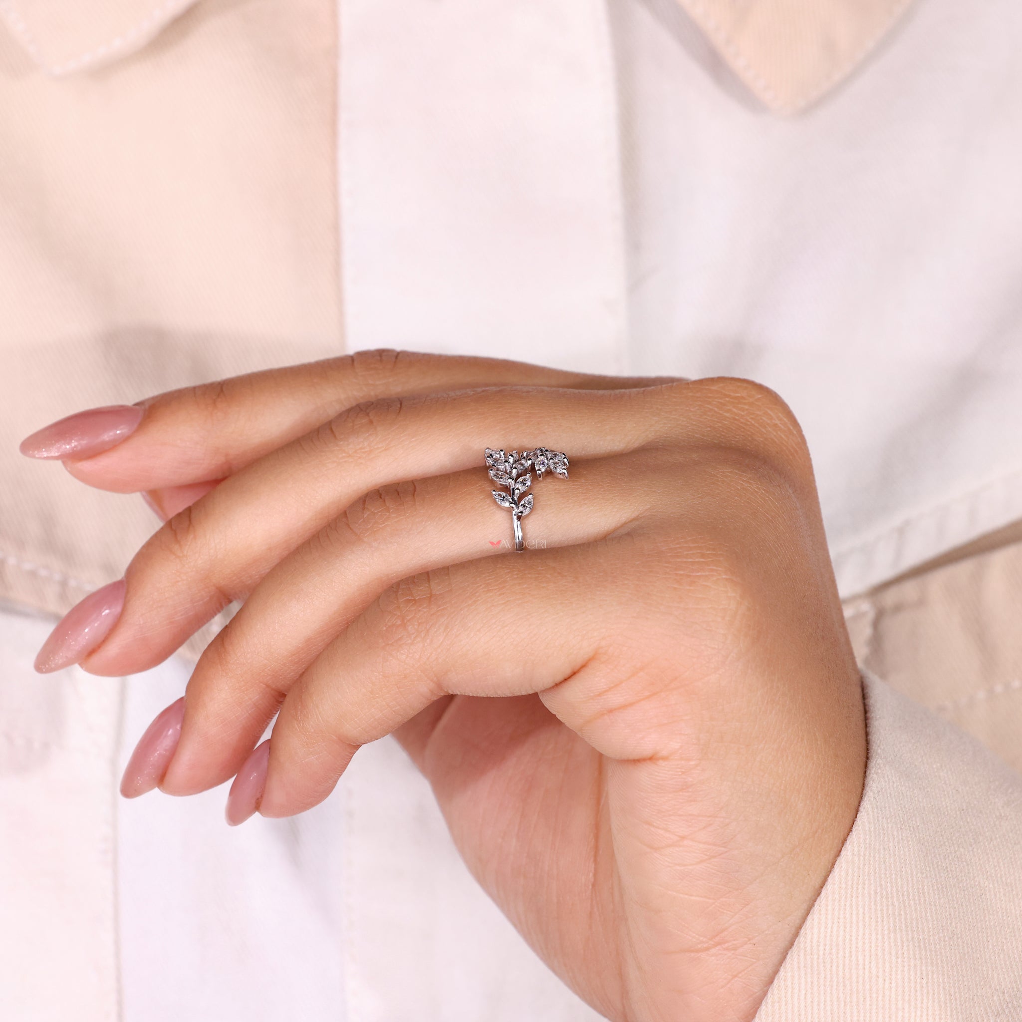 Lab Grown Diamond set in an eco-friendly marquise engagement ring.
