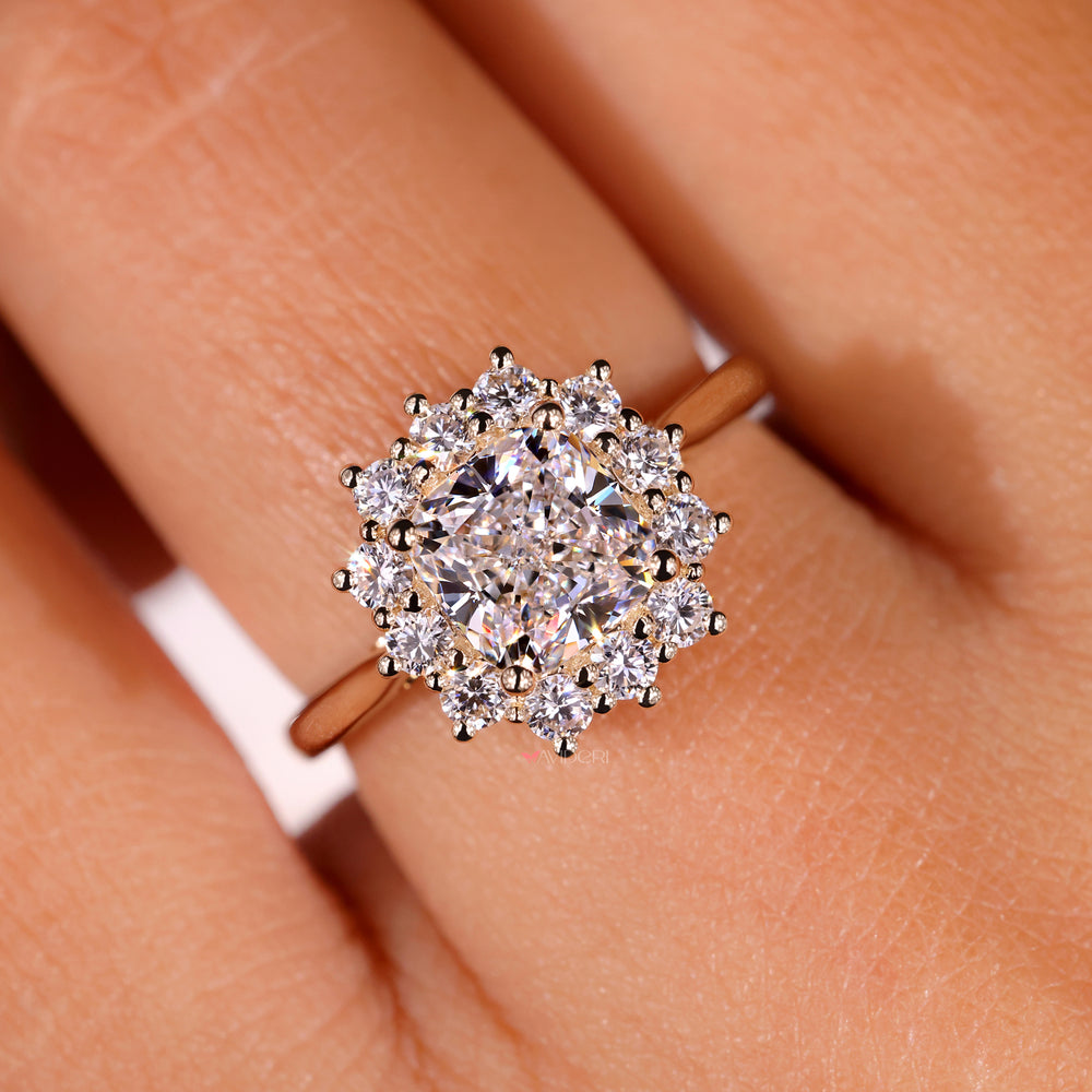 Round diamond engagement ring paired with a cushion cut for a unique style.
