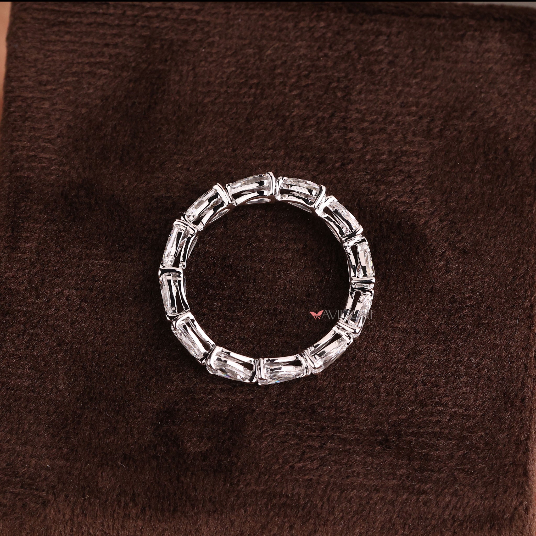 White gold band with a sleek and polished finish.
