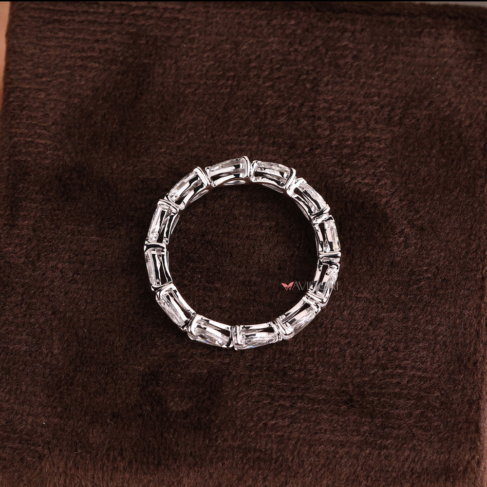 White gold band with a sleek and polished finish.
