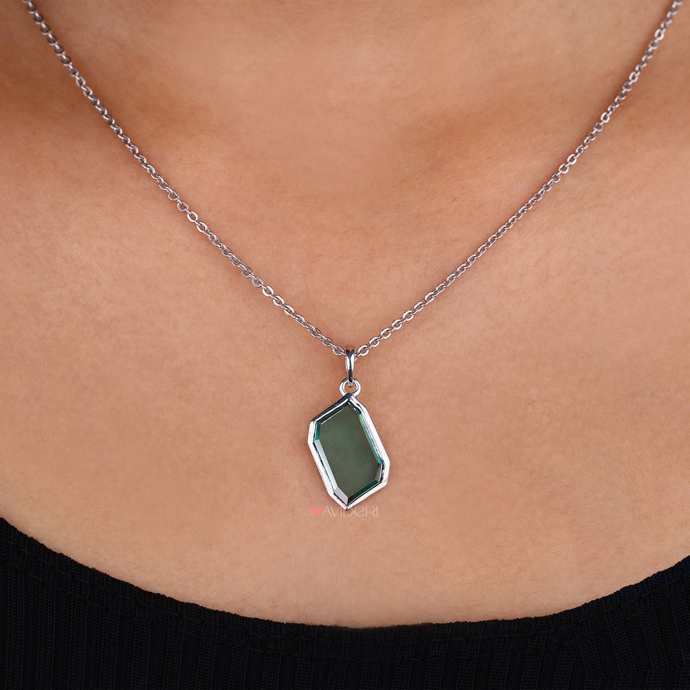 Portrait pendant with intricate details.