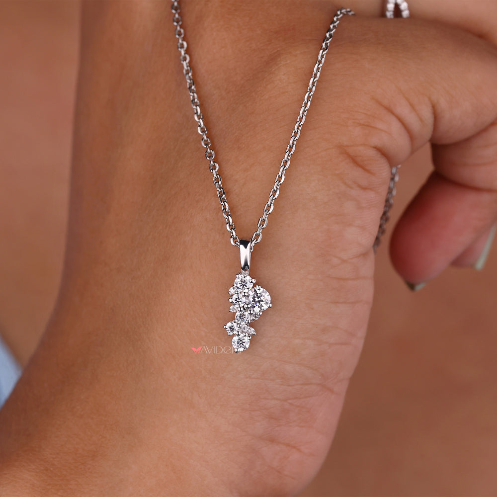 Irregular pendant for necklace featuring an unusual, distinctive shape.
