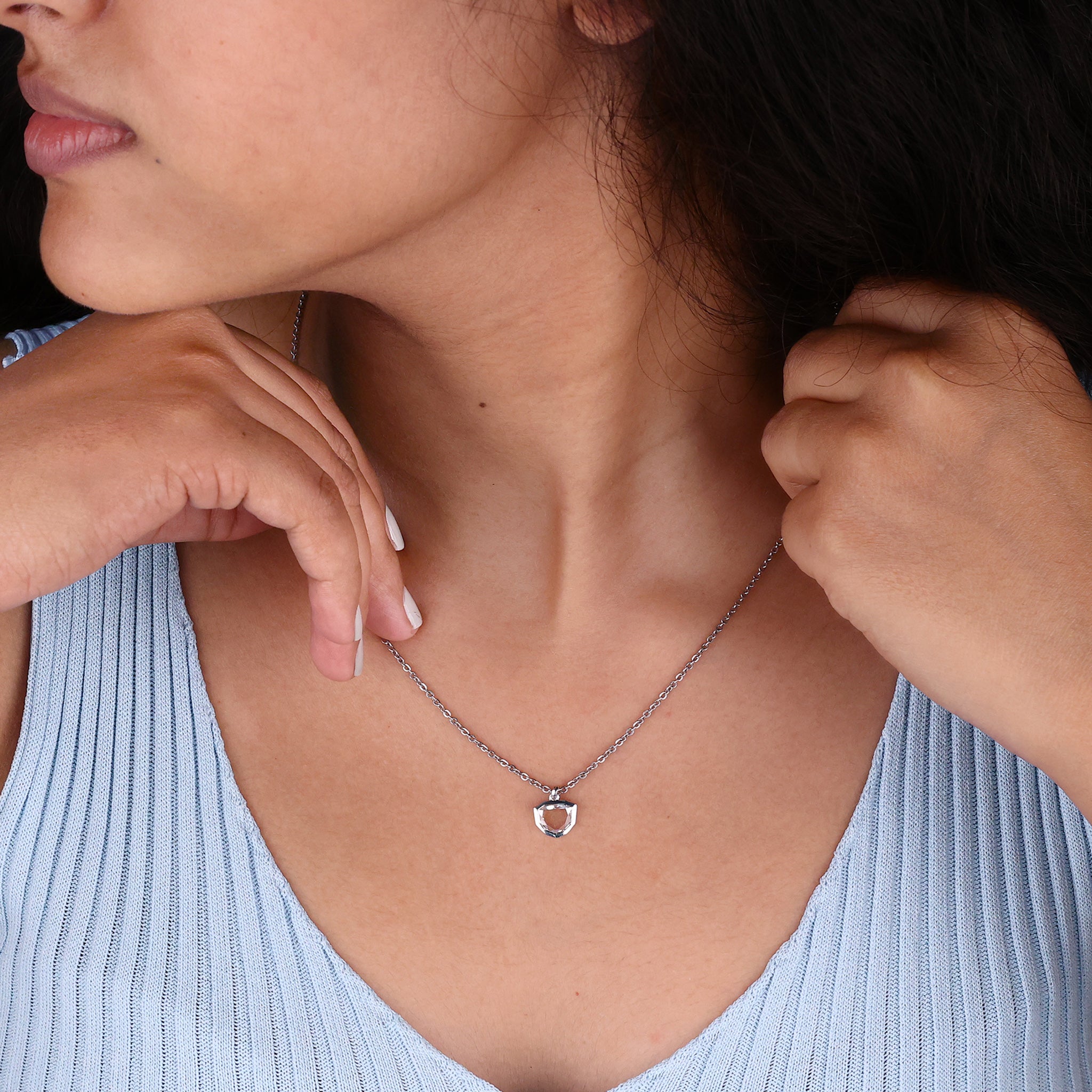 Portrait Pendant, showcasing a timeless design with a unique portrait-cut stone.