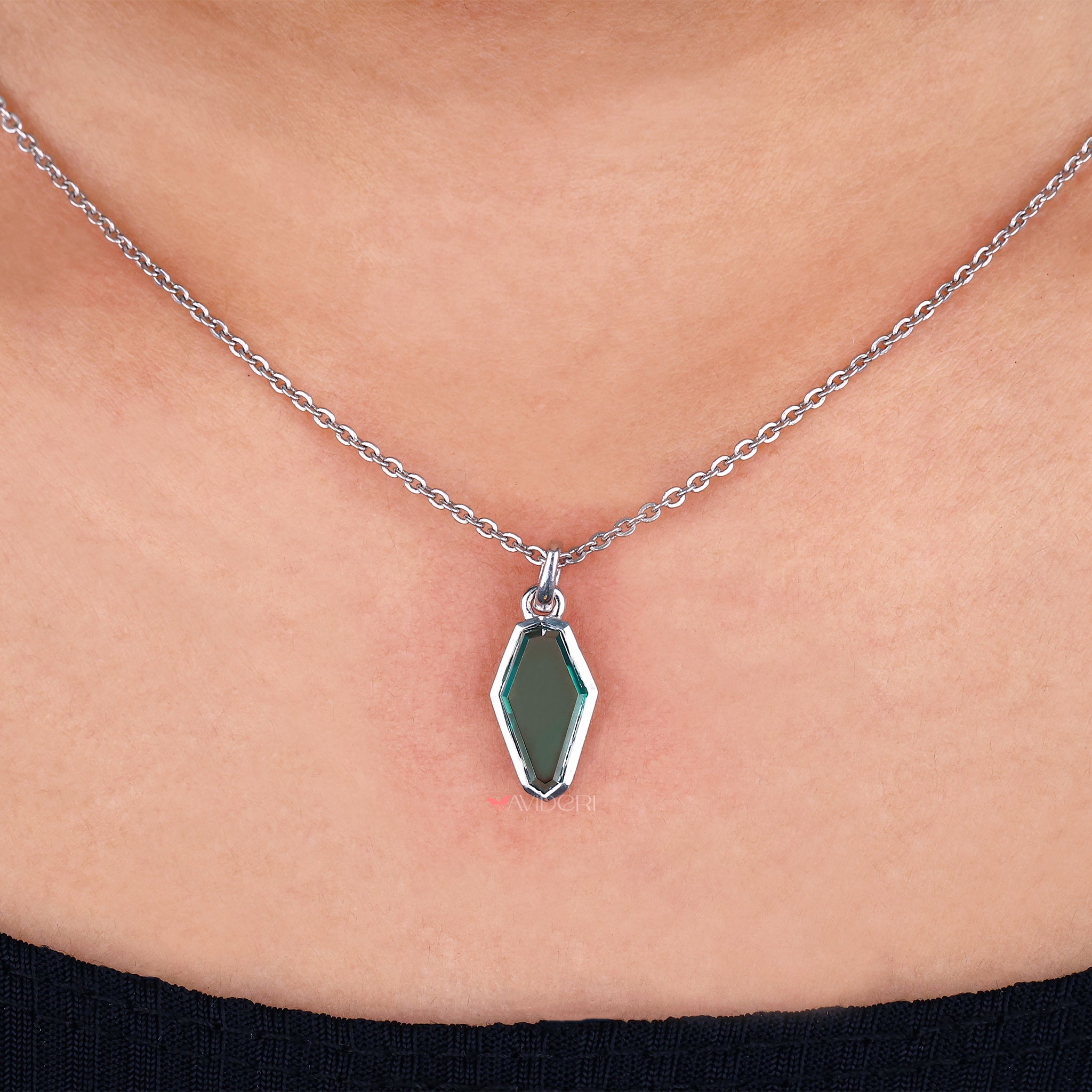 Portrait Cut Coffin Moissanite Pendant blends vintage design with stunning brilliance.