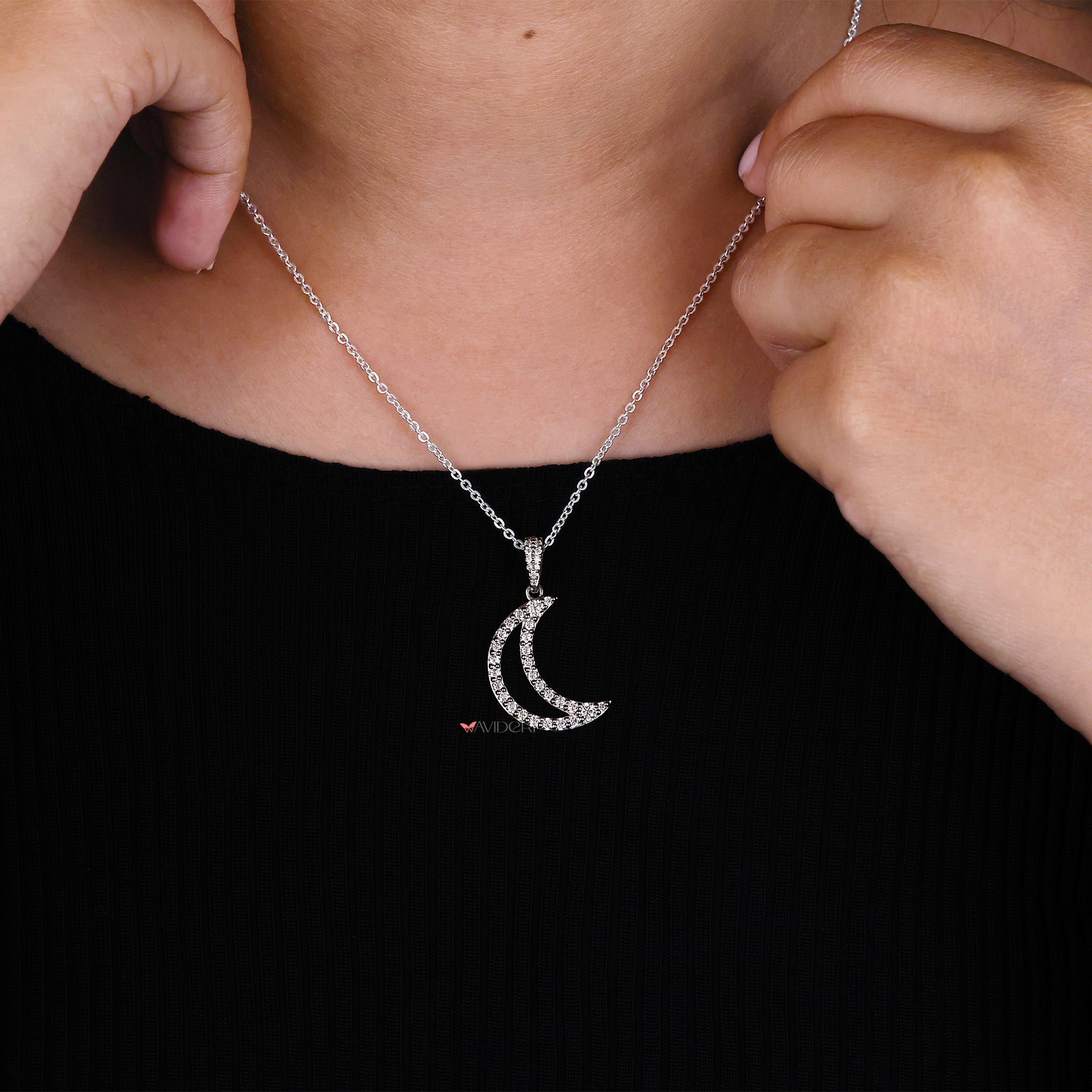 White gold pendant provides a bright, sophisticated finish to any look.