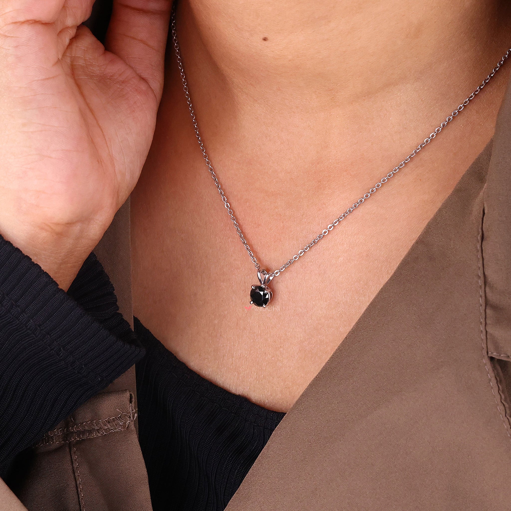 Black moissanite pendant featuring a round cut pendant for a unique style.