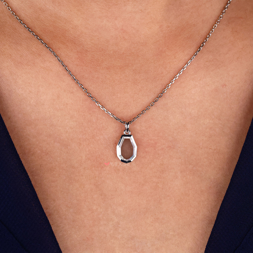 Pear Portrait Cut Moissanite Pendant, featuring a unique cut for added sophistication and elegance.