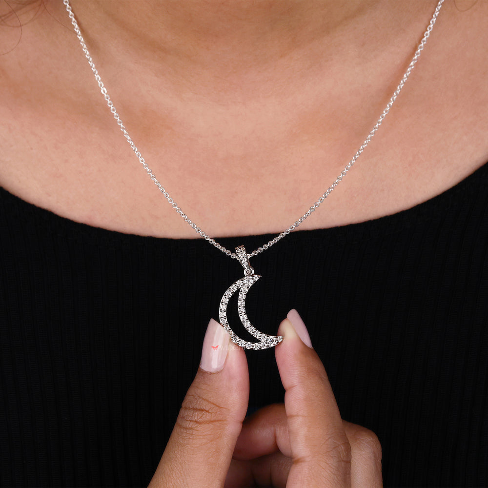 Prong setting secures stones while allowing light to enhance their shine.
