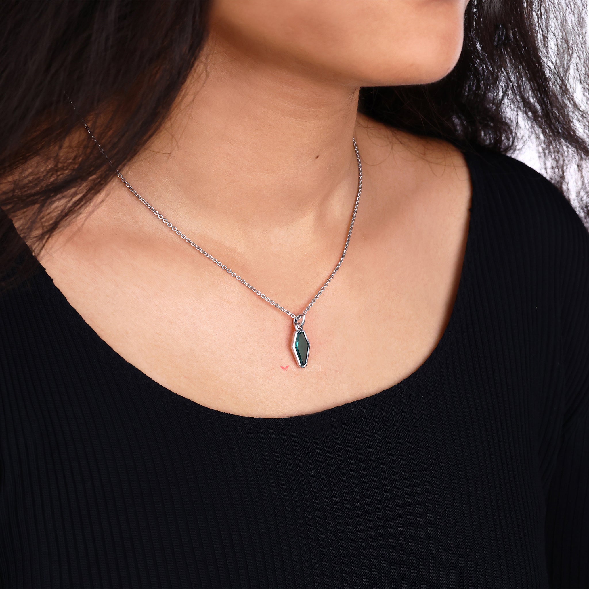 Portrait Cut Coffin solitaire moissanite pendant captures timeless appeal with focused shine.