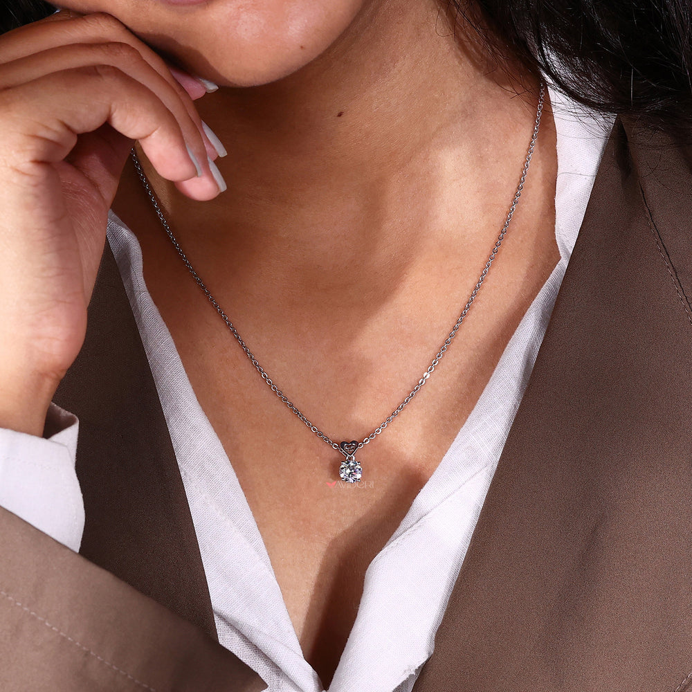 Elegant round cut pendant that adds a touch of sophistication to any outfit.