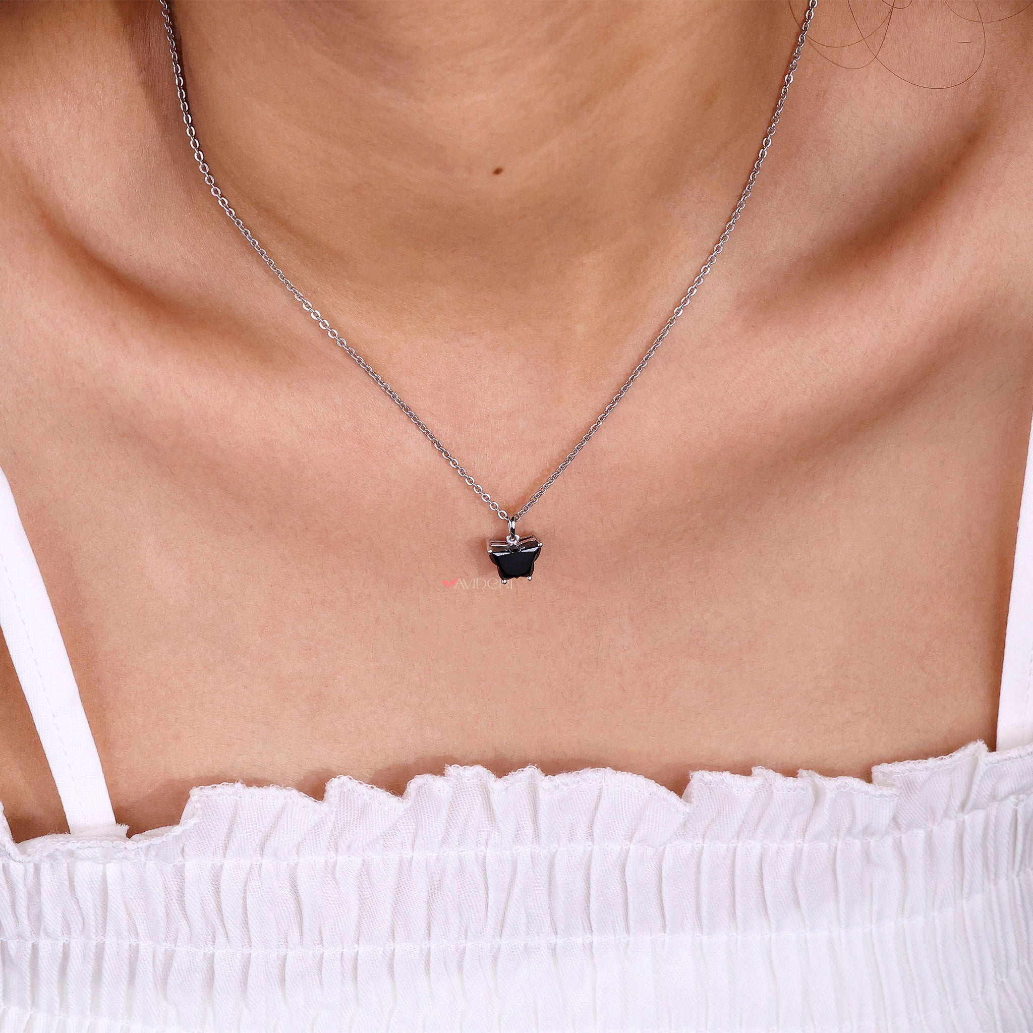 Handmade pendant featuring a butterfly design in gold for a personal touch.