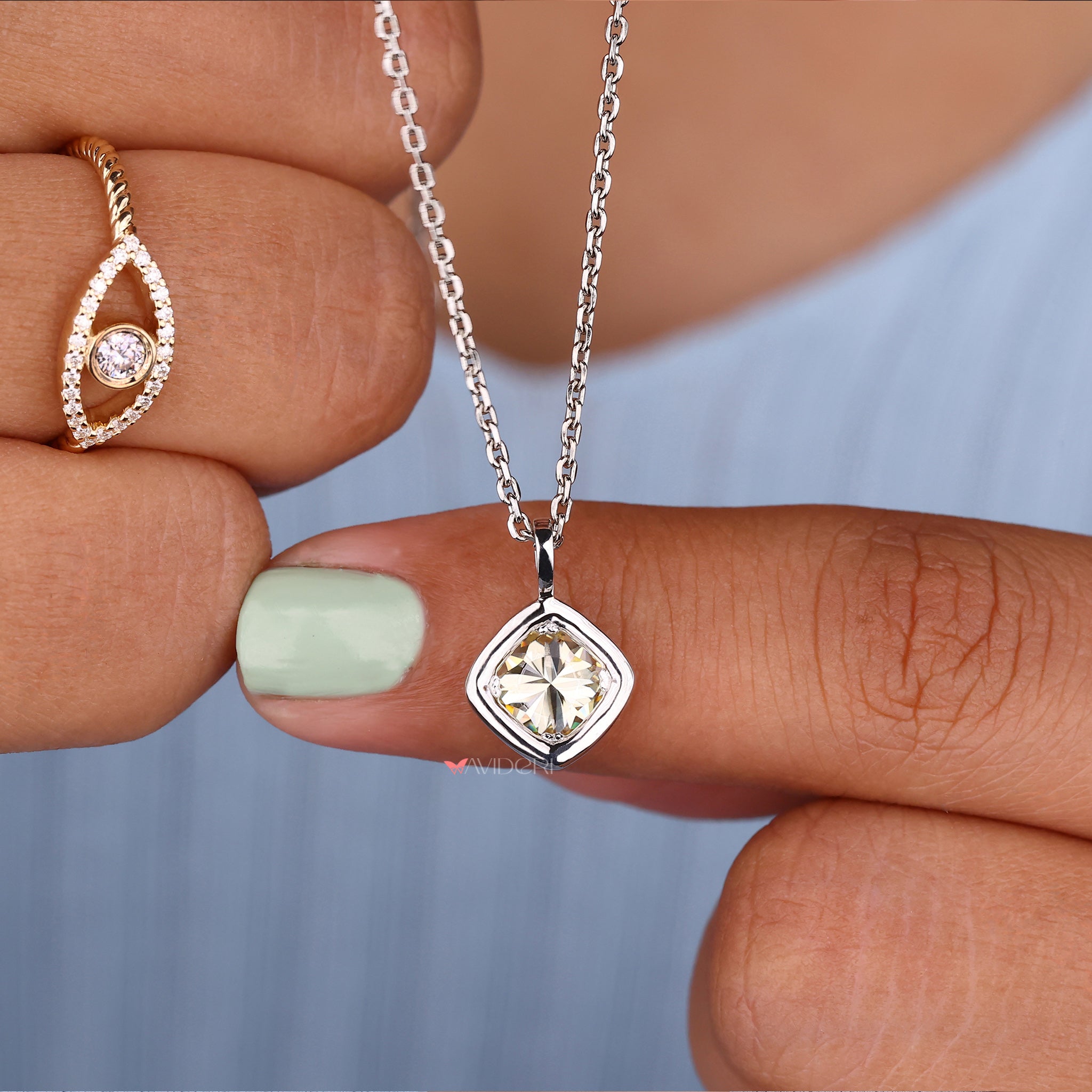 white gold pendant with a luxurious, polished finish.