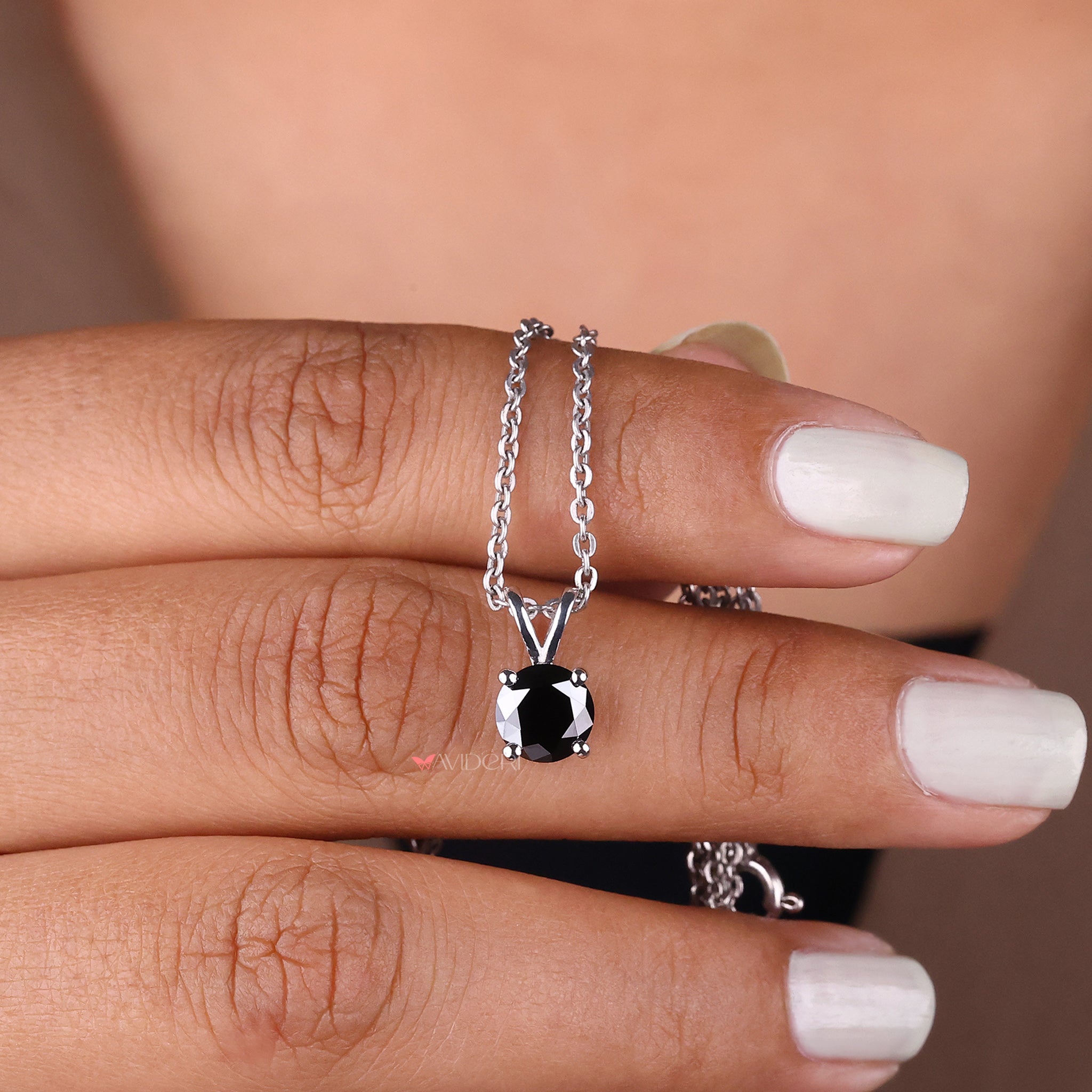 Solitaire pendant with a round cut pendant for a timeless look.