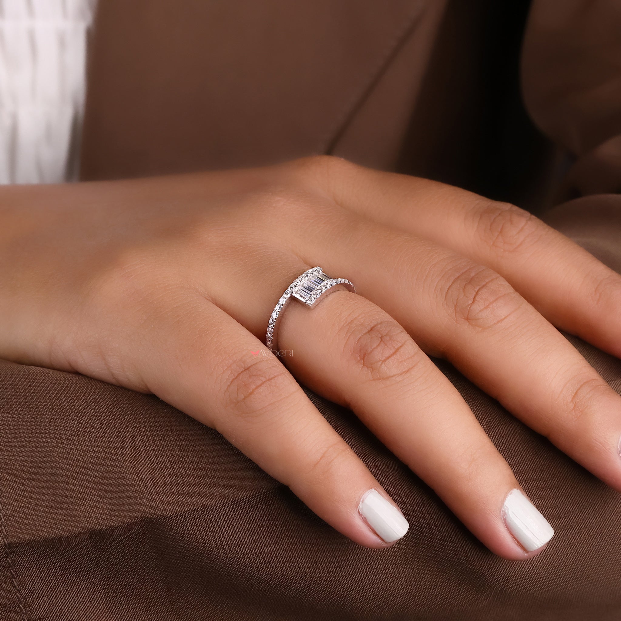An Avideri ring displayed on a light surface.
