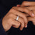 Round diamond wedding ring delivers classic style with sparkling detail.
