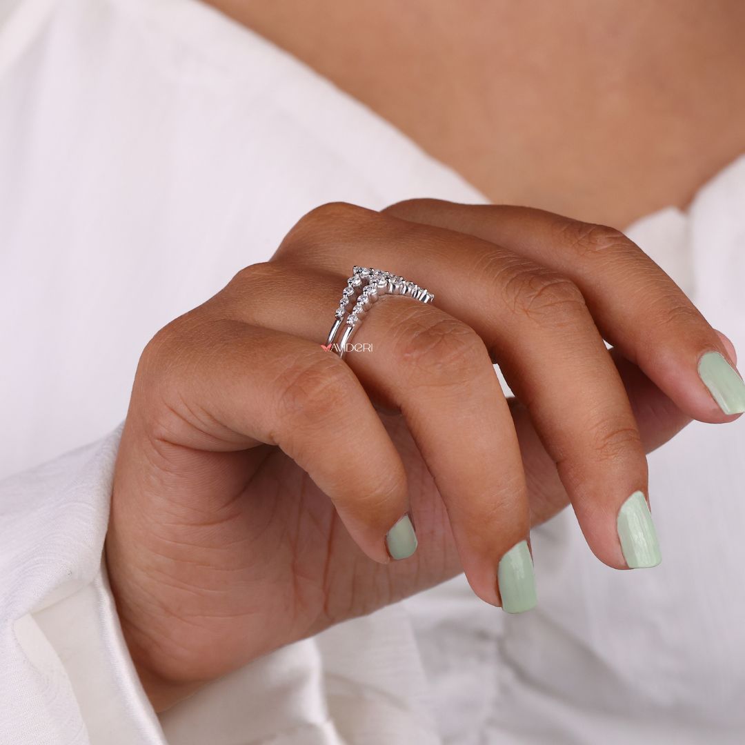 Chevron wedding band enhances the finger with a distinct angular design and stylish flair.
