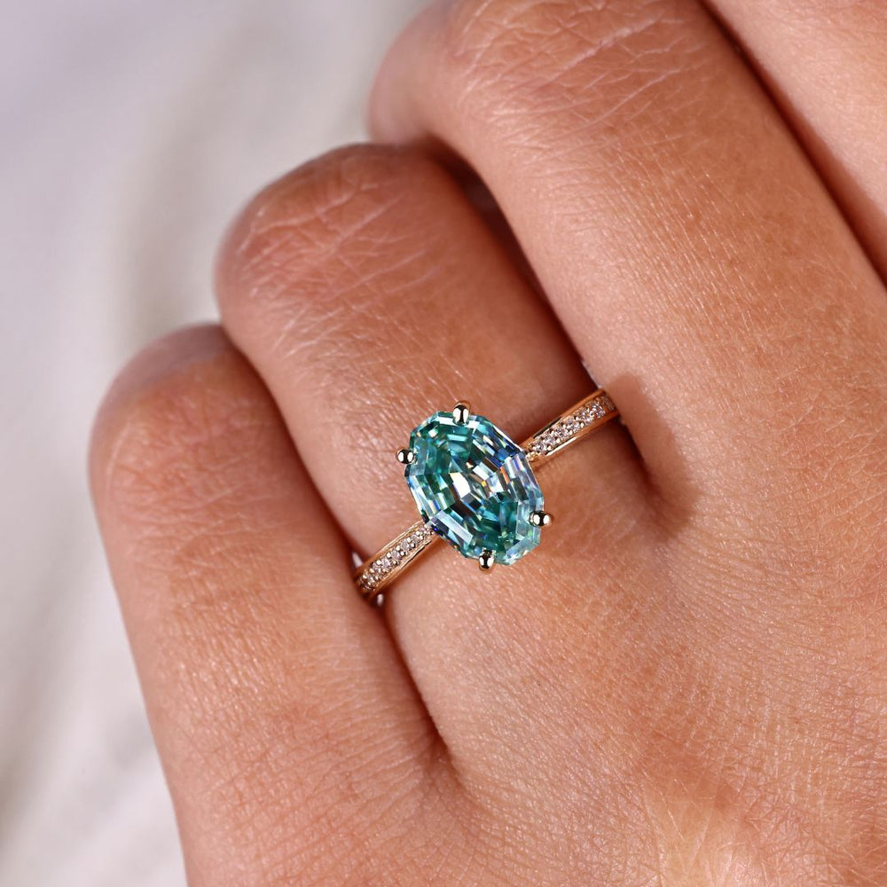 This moissanite cathedral ring shines in a unique setting.

