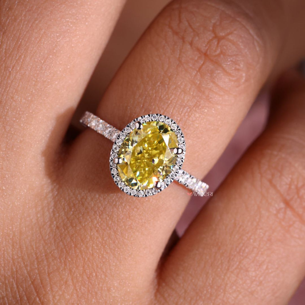 Canary yellow moissanite ring with a vibrant and stunning design.
