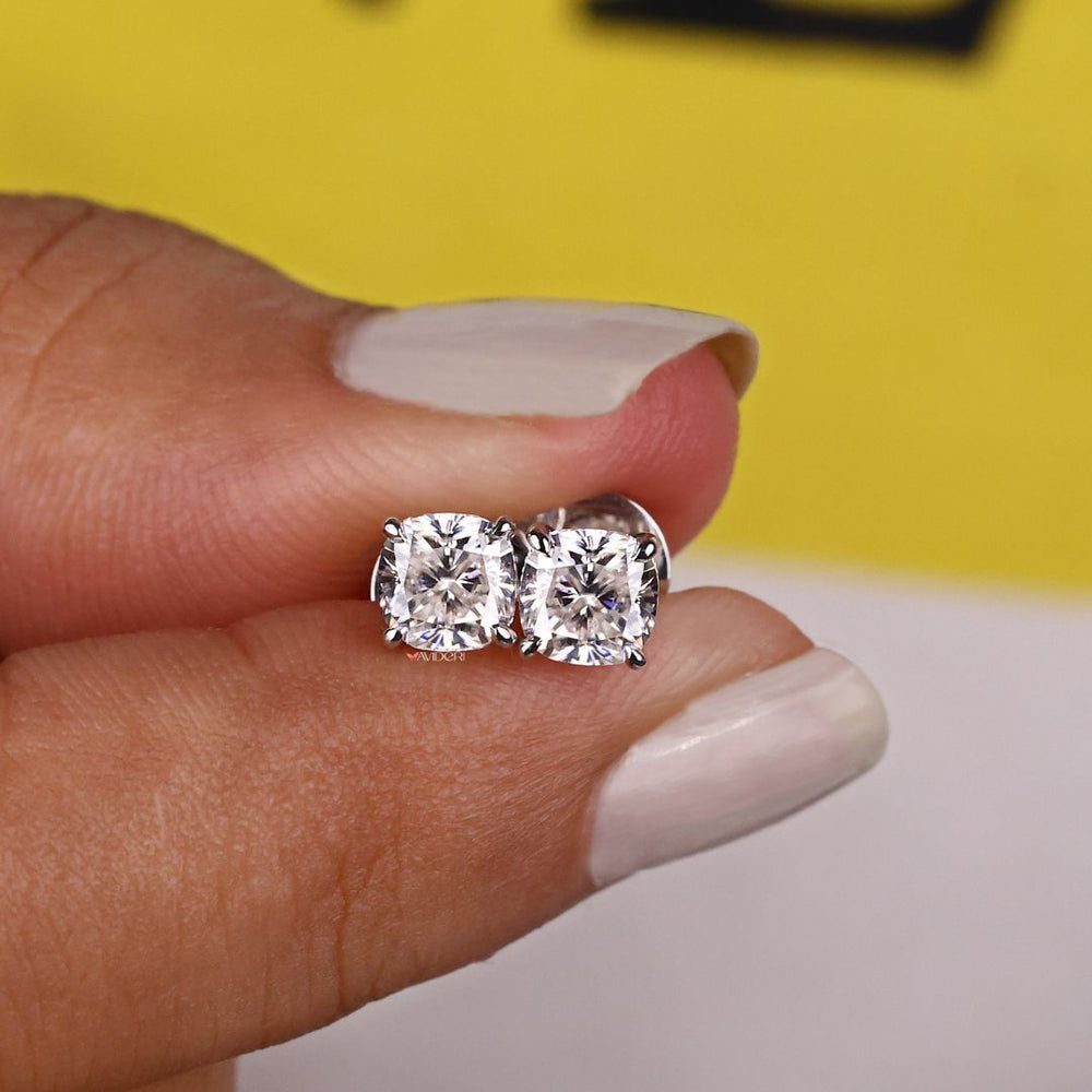 The 4 claw prong set earrings securely hold the gemstone.