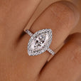 Gold marquise cut ring set in a sleek band
