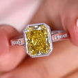 Moissanite engagement ring with radiant cut setting
