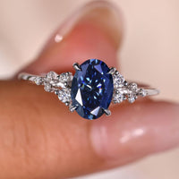 Blue Moissanite Ring with Oval Snowdrift Side Sparkle