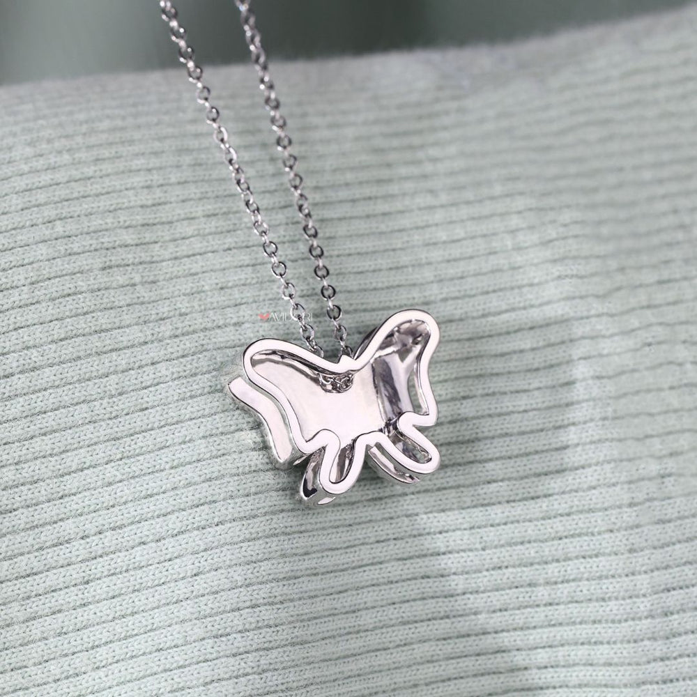 White gold butterfly pendant featuring fine diamond accents

