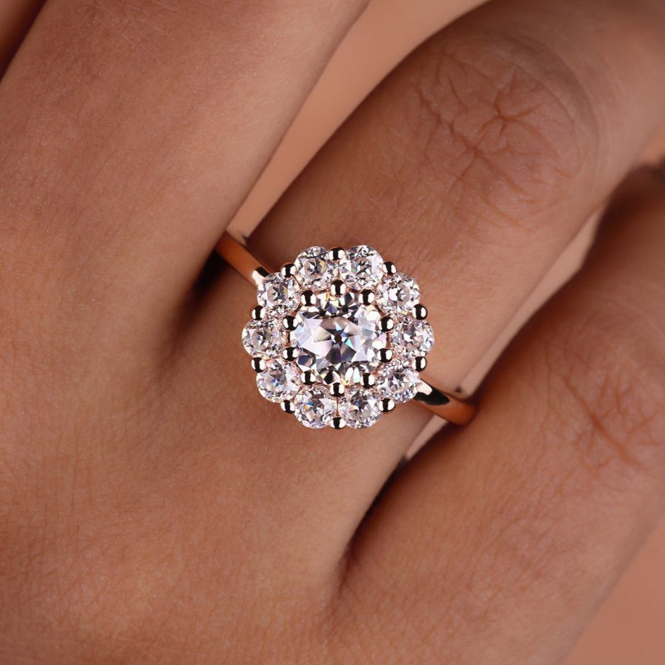 Halo cluster ring with elegant diamond arrangement.
