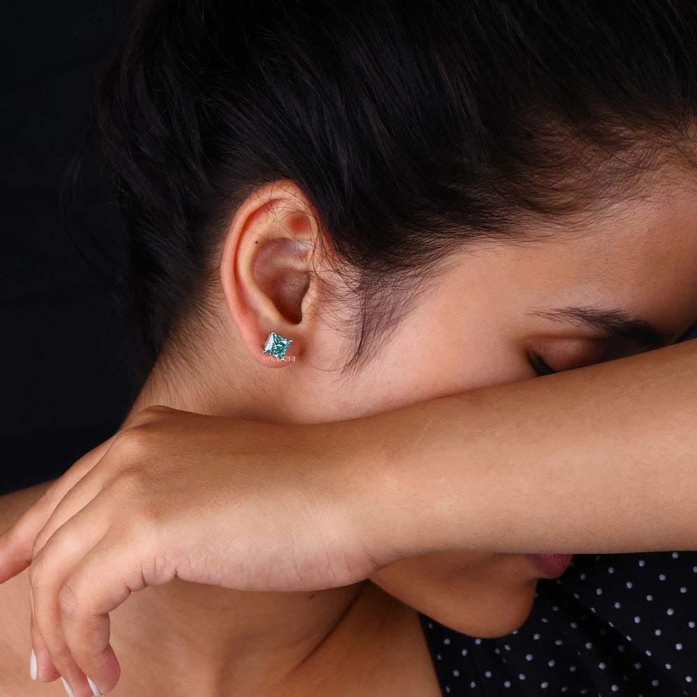 Moissanite stud earrings in white gold with elegant 4 prong settings.