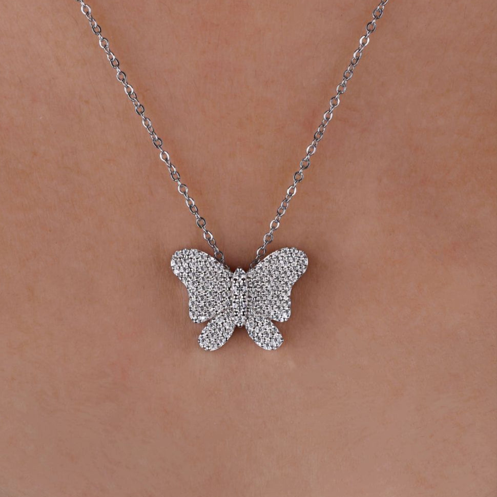 Butterfly pendant with delicate handcrafted details
