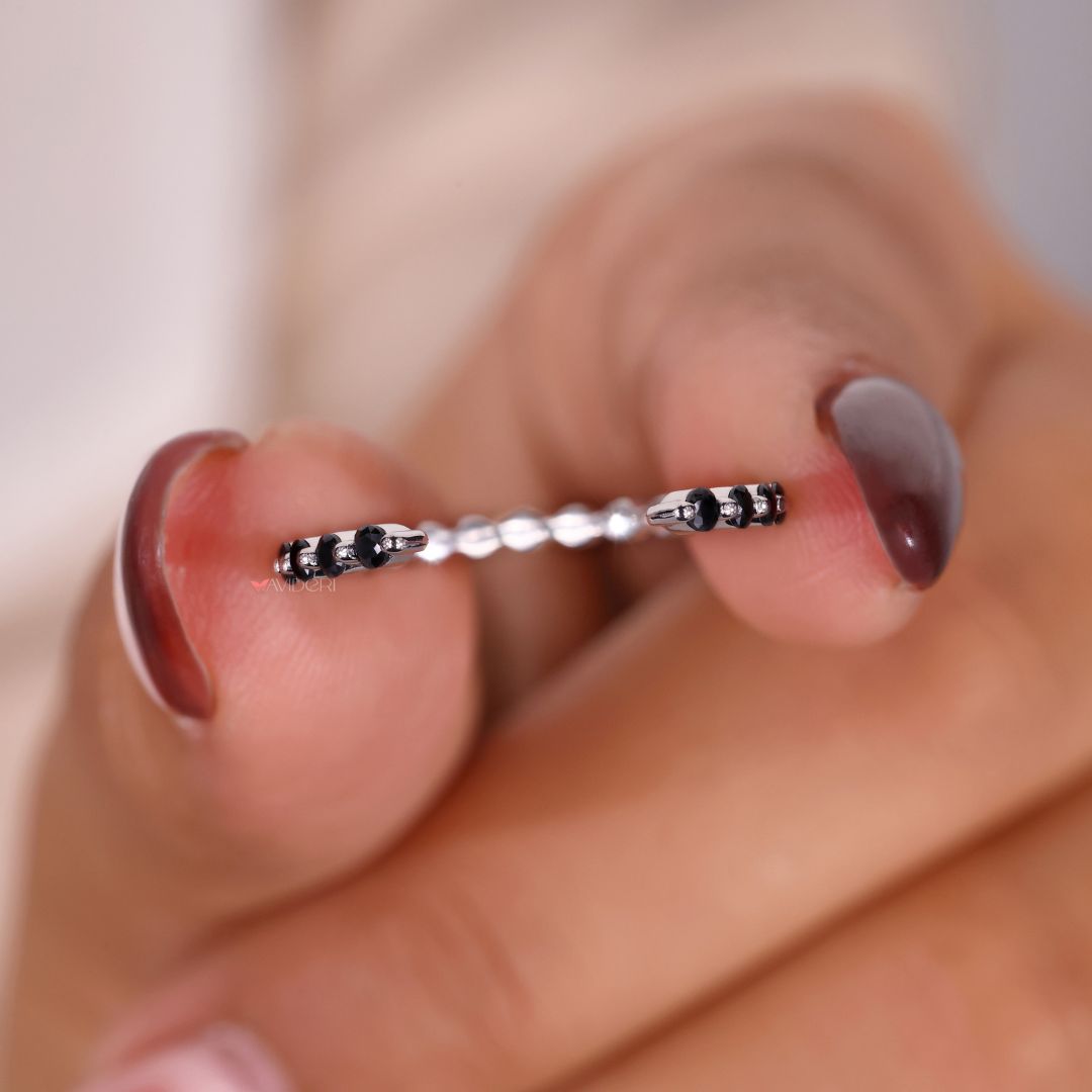 This round wedding band offers a timeless, symmetrical look.