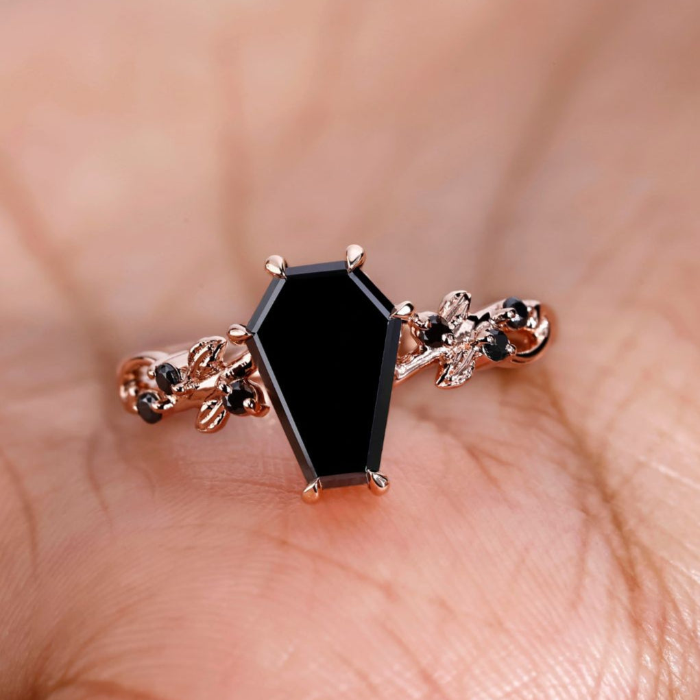 Coffin engagement ring with a unique and timeless design.
