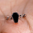 Coffin engagement ring with a unique and timeless design.
