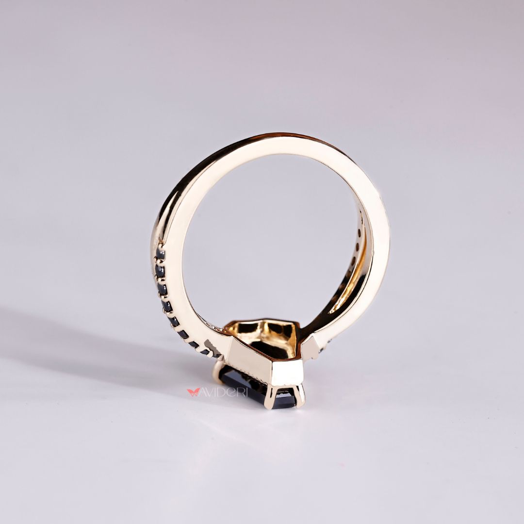 Yellow Gold Stylish black ring featuring a distinctive and bold design.

