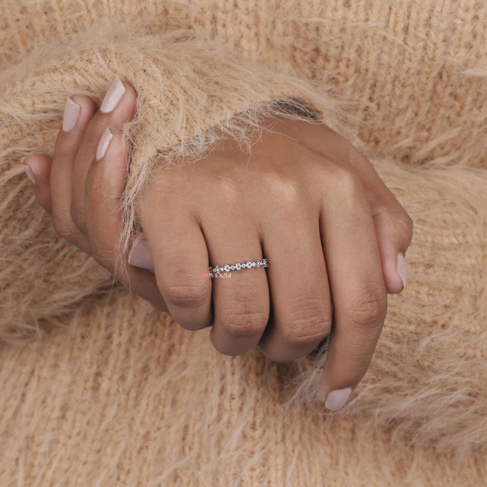 This designer wedding band is handcrafted for a unique and luxurious look with fine detailing.
