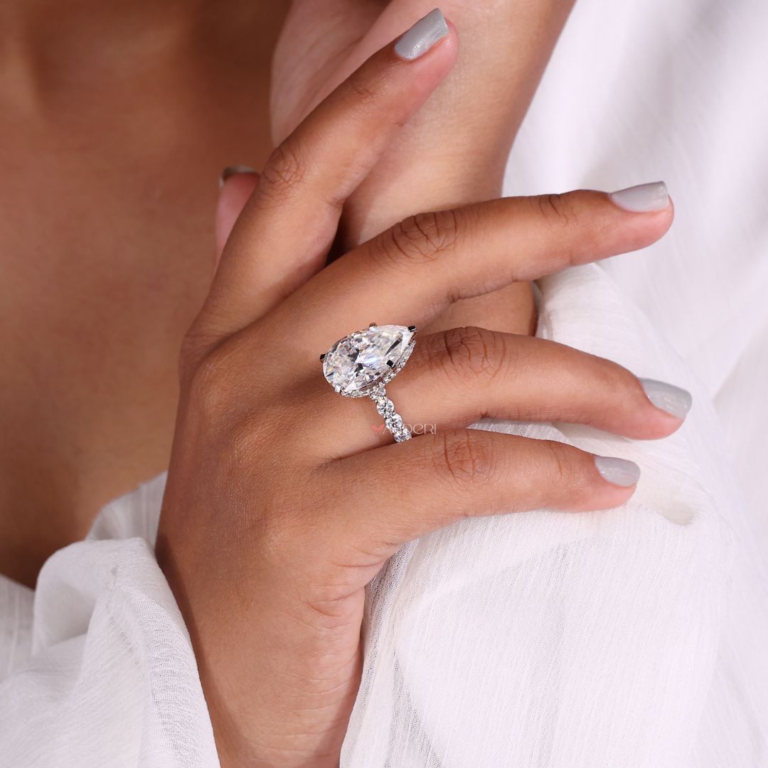 White gold engagement ring with a unique design.
