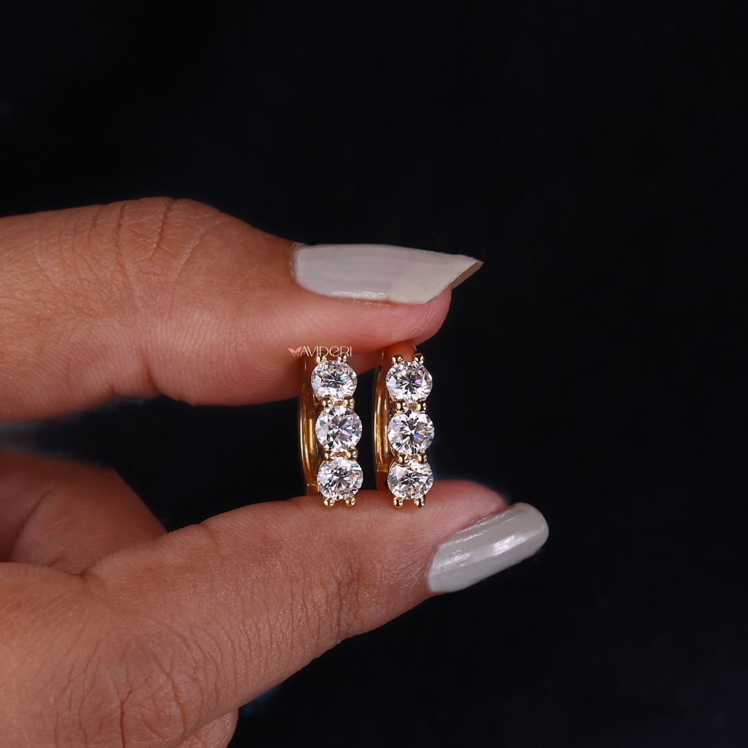 Moissanite hoop earrings shine with lasting brilliance.