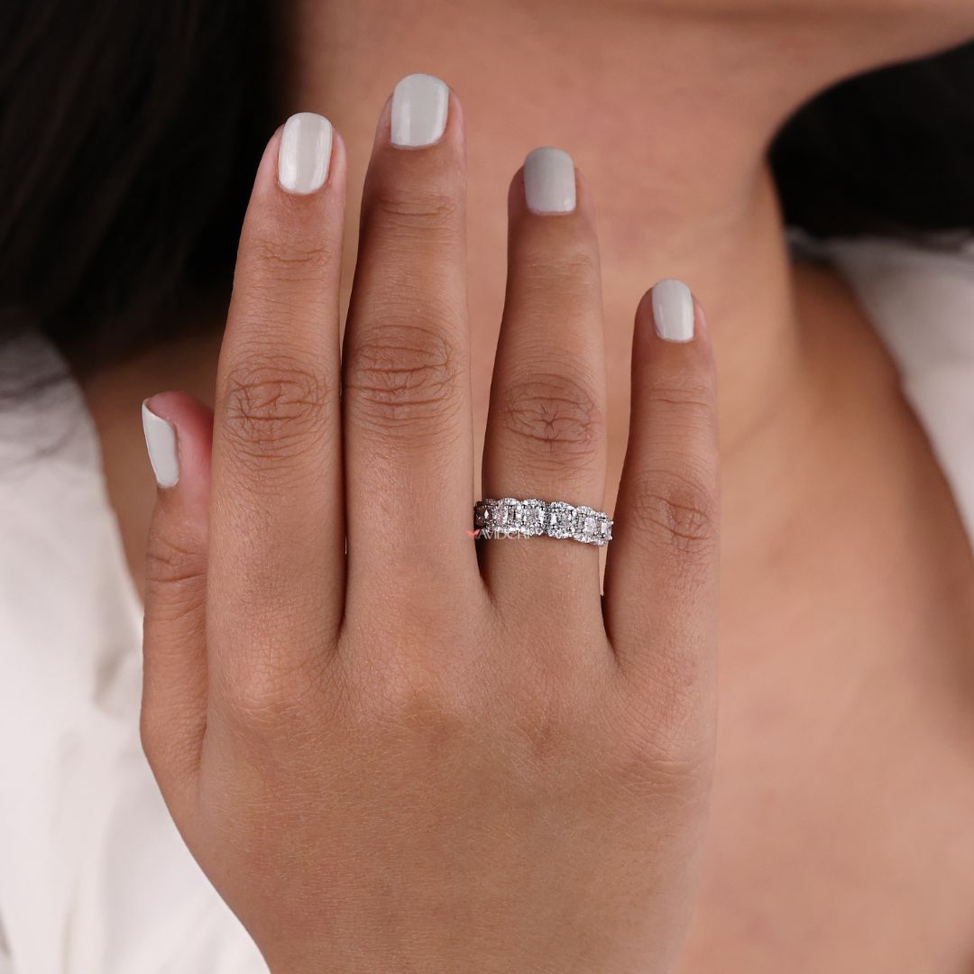 Seven stone band displays evenly spaced stones for a balanced and radiant appearance.
