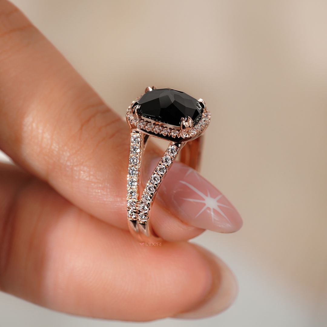 Cushion engagement ring featuring a rose cut center stone for brilliance.
