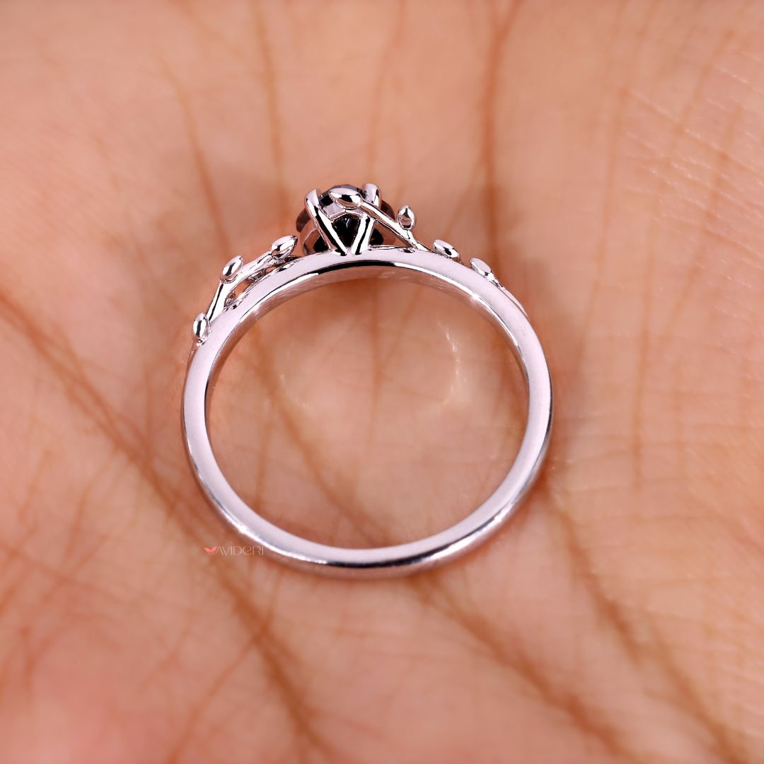 Elegant white gold ring featuring a beautiful heart cut engagement ring.
