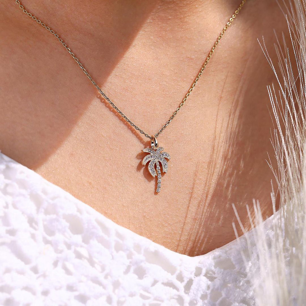Round diamond necklace pendant with a sparkling design.
