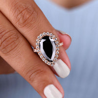 Black Pear Cut Engagement Ring Set in Halo Design
