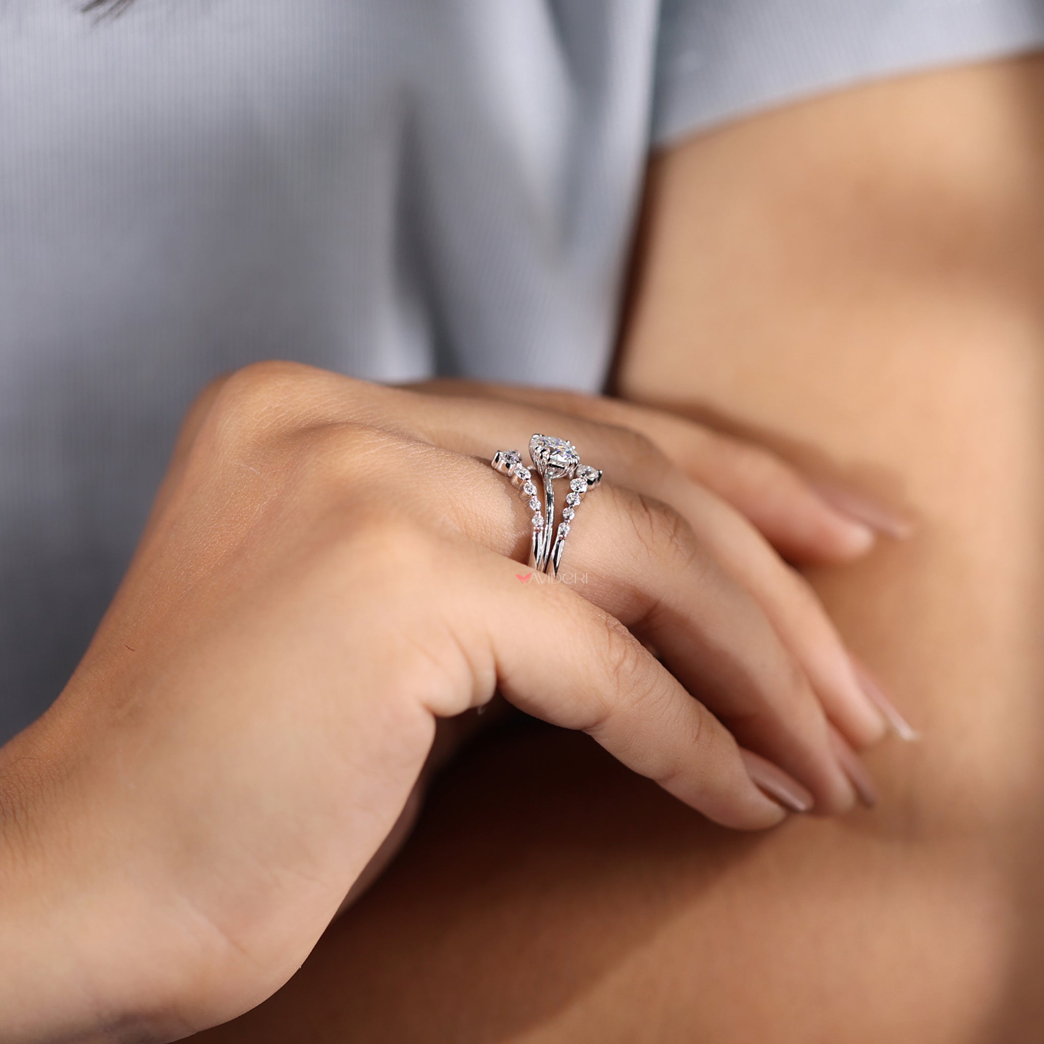 White gold bridal sets including a round cut solitaire ring.
