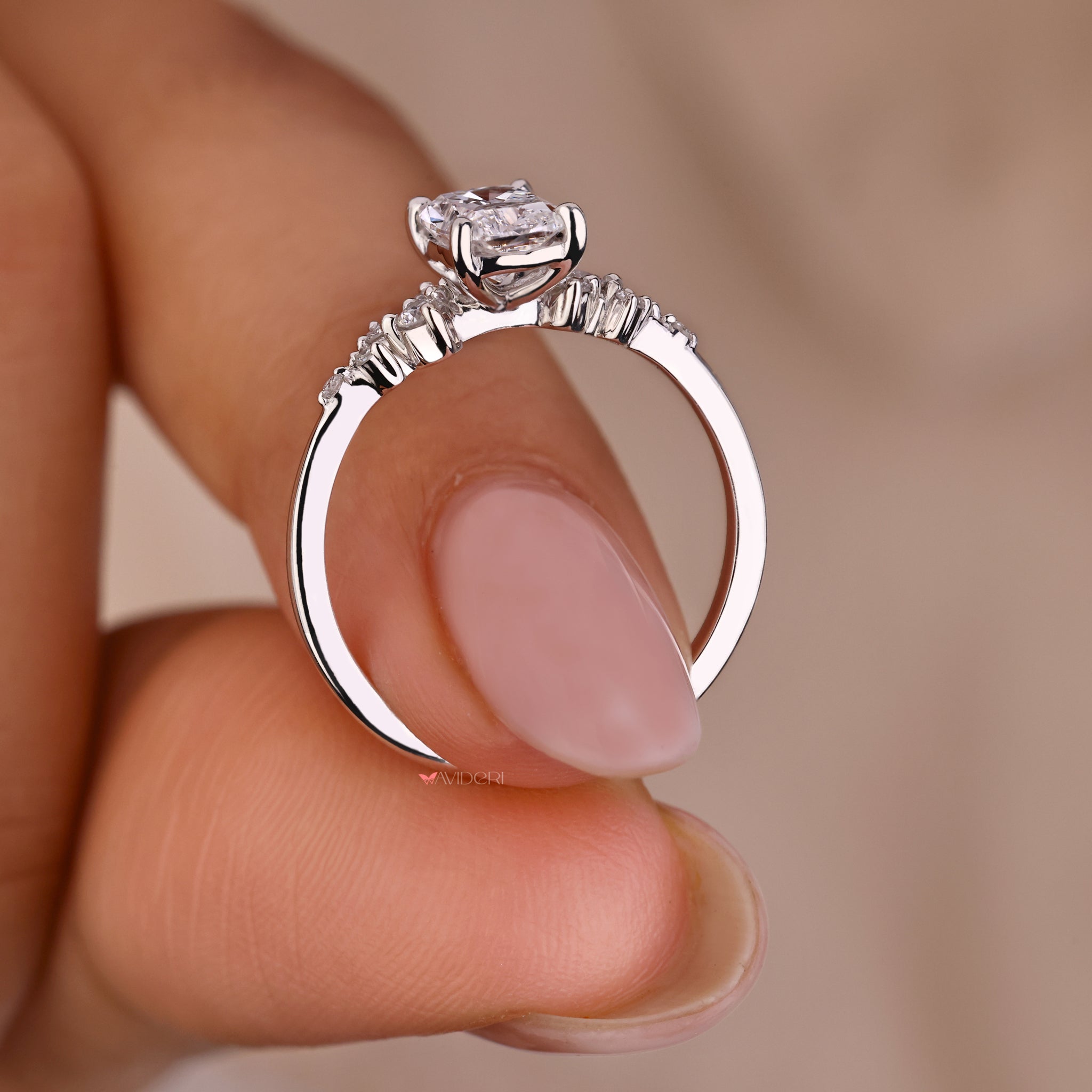 White gold engagement ring with a cushion cut centerpiece

